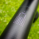A photo of the small screen in a VanMoof bike frame showing a padlock symbol.
